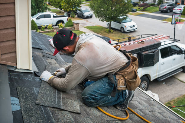 Professional Emergency Roof Repair technician working in North Henderson, IL